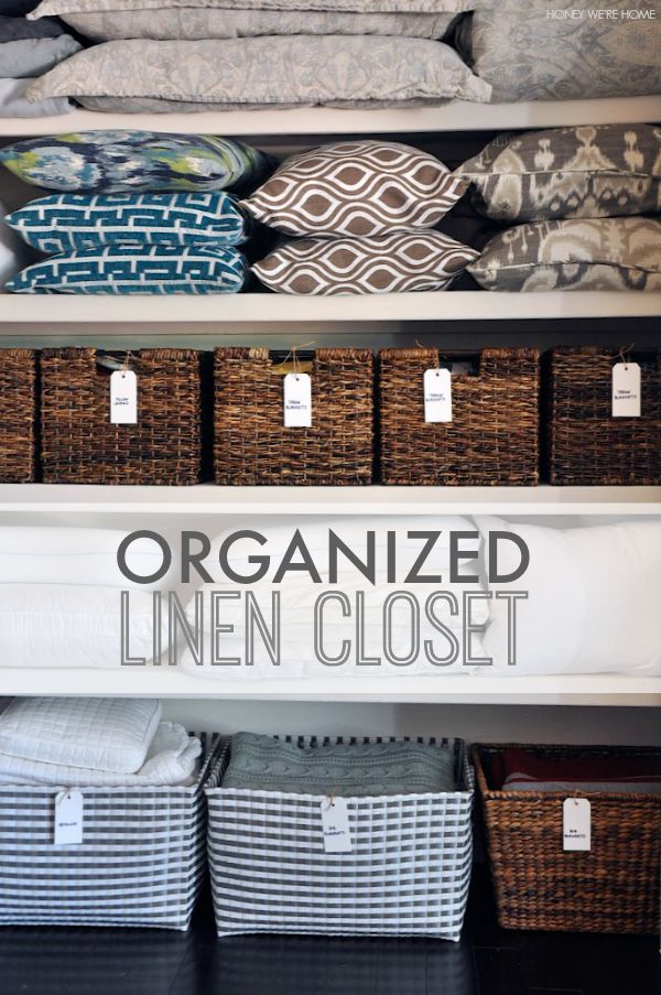 Organized Linen Closet with woven bins from Target and handwritten labels | Honey We're Home