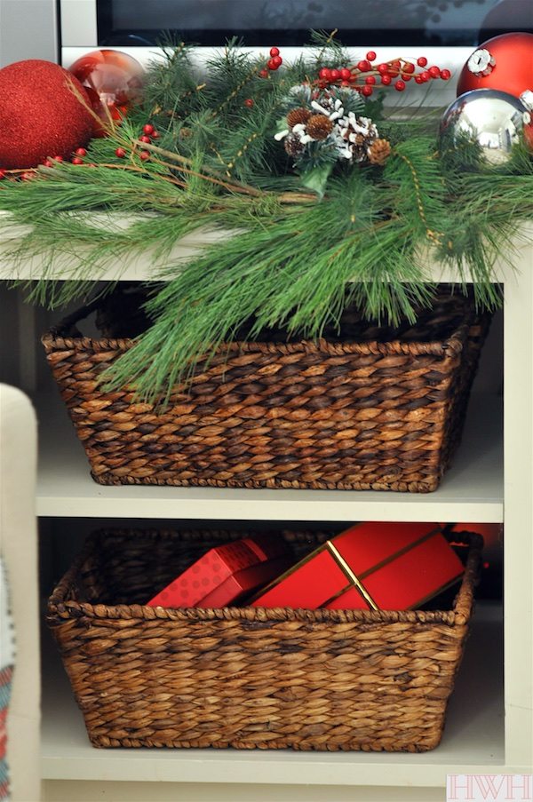 Festive holiday decor- fresh garland, berries and ornaments | Honey We're Home