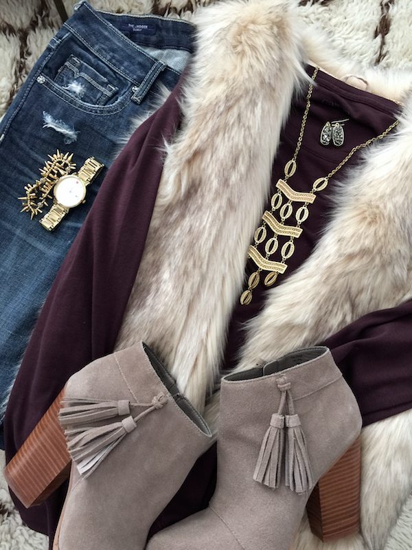 Fall & Winter Fashion - distressed jeans, plum top, faux fur vest, booties and gold accessories - fun date night or girl's night out!