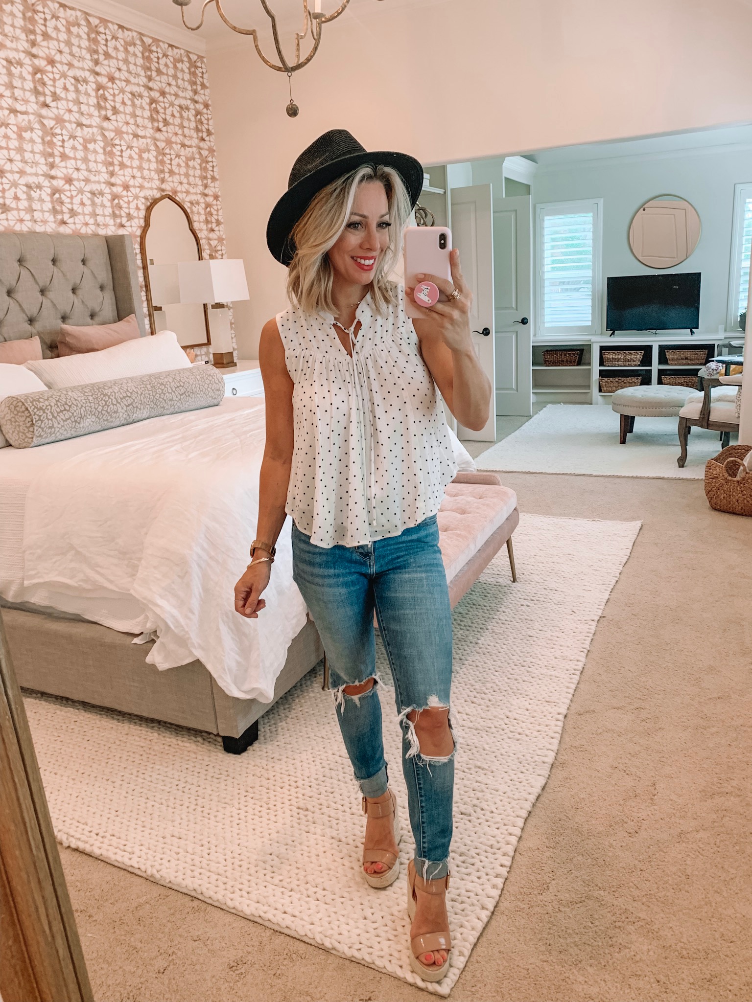 Polka dot top and ripped jeans with wedges