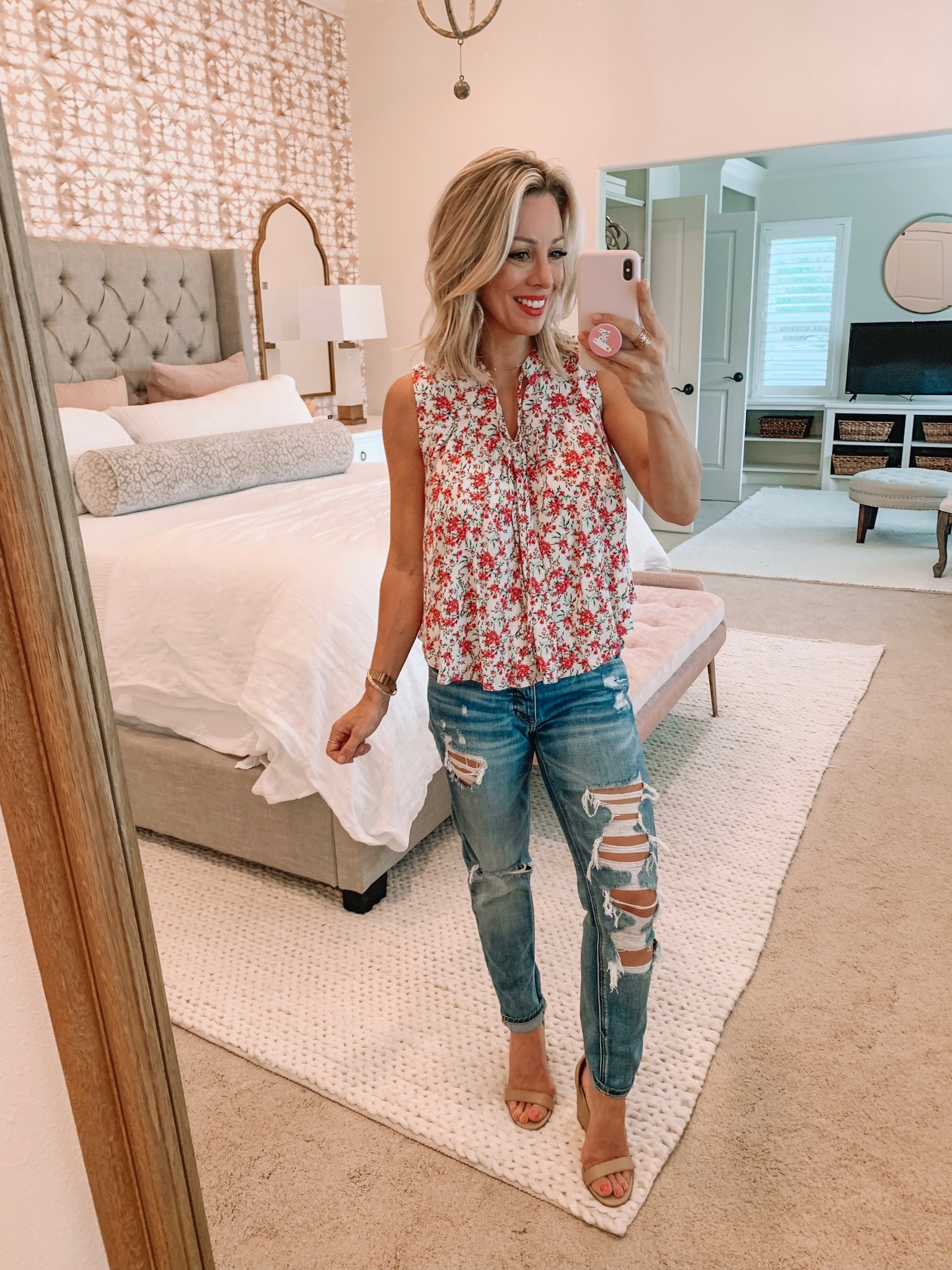 Floral top and ripped jeans with wedges