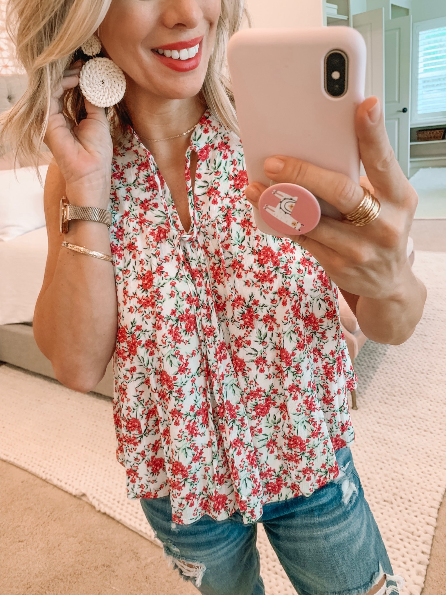 Floral top and ripped jeans with wedges