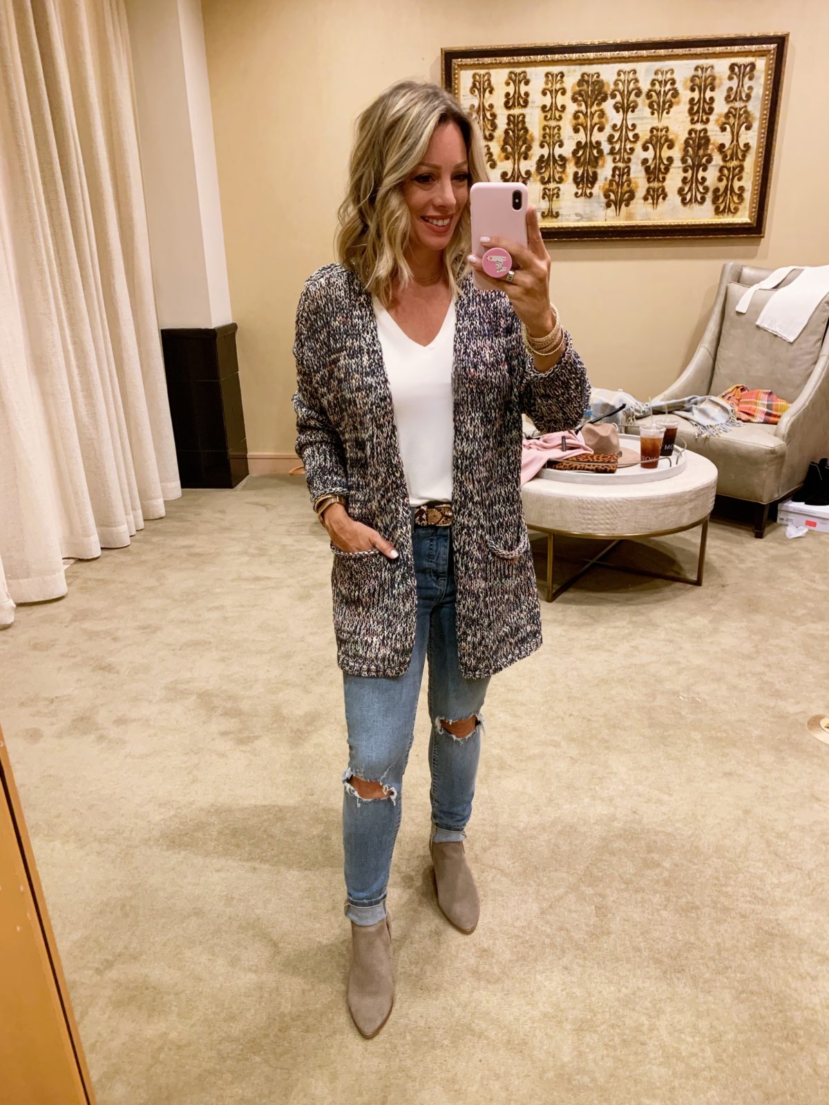 Nordstrom Anniversary Sale - white top and a rainbow cardigan with Jeans and boots