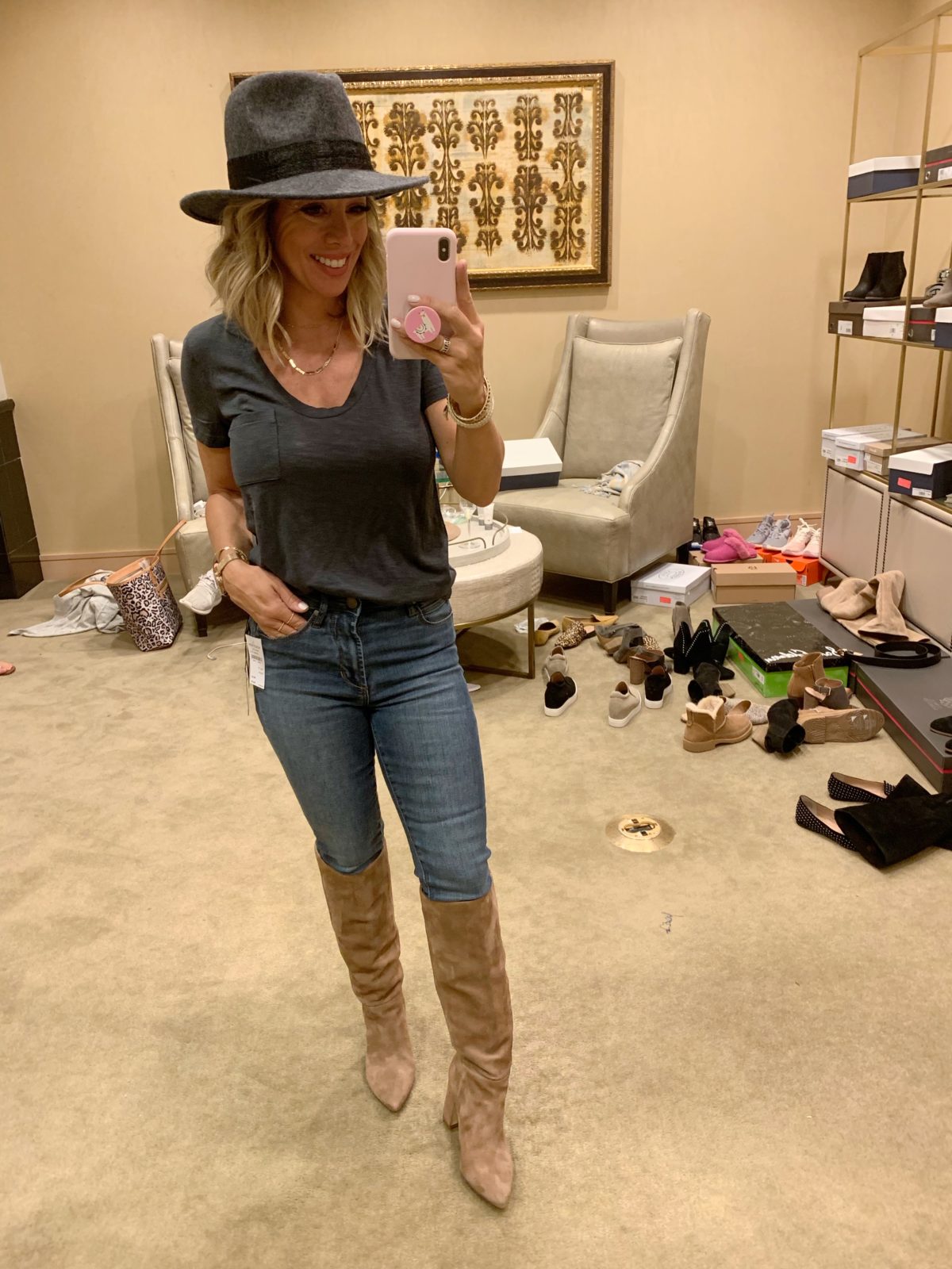 Nordstrom Anniversary Sale - grey top with jeans and Sam edelman tall boots with a grey hat